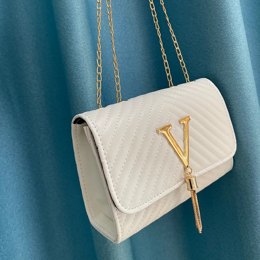 GlamourGrip Tassel Tas - Modieus en duurzaam.