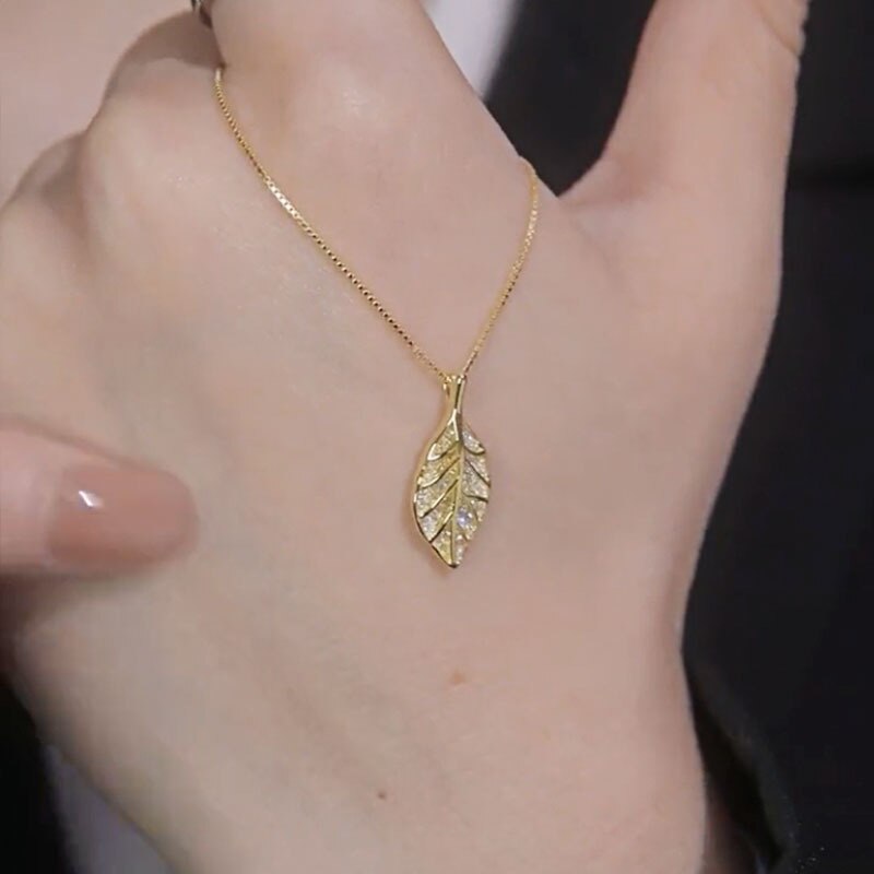 Gouden Blad Ketting - Goud, glans en glamour.